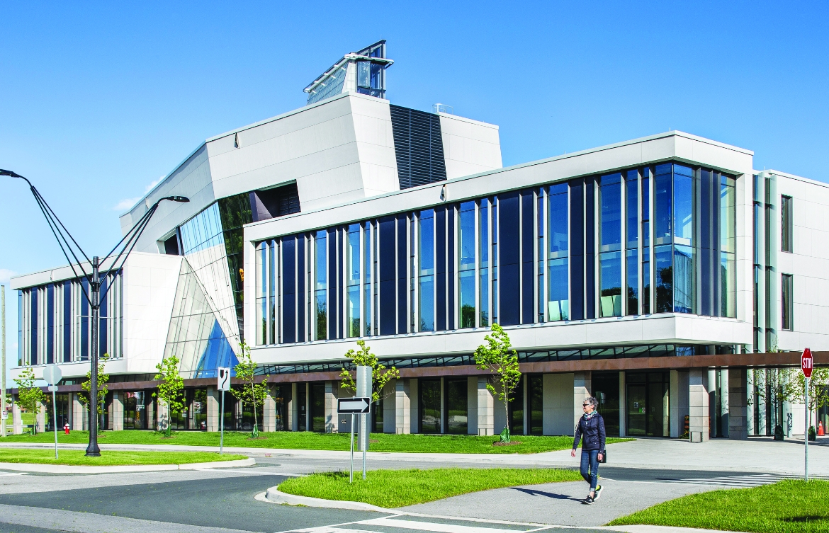 Exterior photo of The Rob and Cheryl McEwen Graduate Study & Research Building.